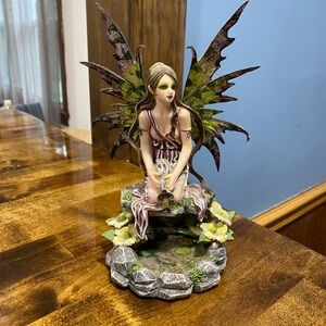 Enchanted Fairy Figurine with Green and purple Wings
